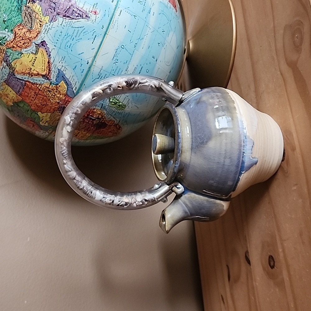 Beautiful artisan pottery tea pot with seashell handle